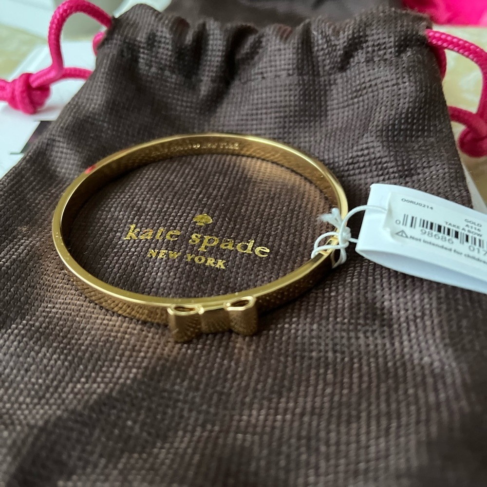 BRAND new Kate Spade bow bracelet with tags on!